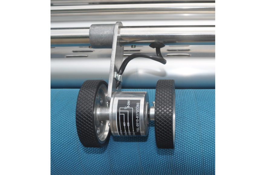 富怡吹風式自動對邊松布機